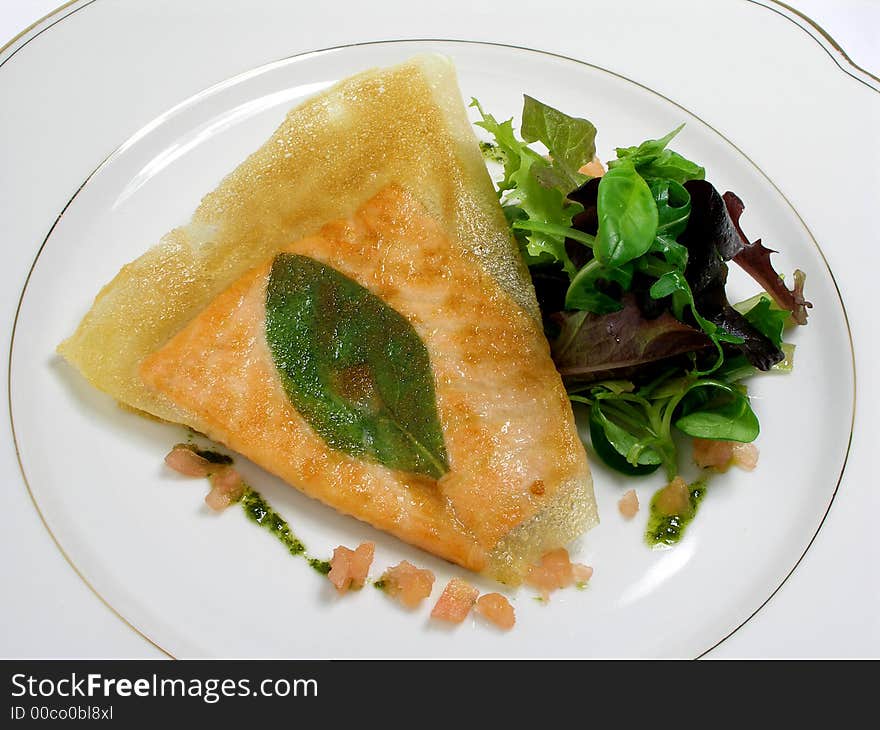 Salmon fillet in phillo pastry with salad