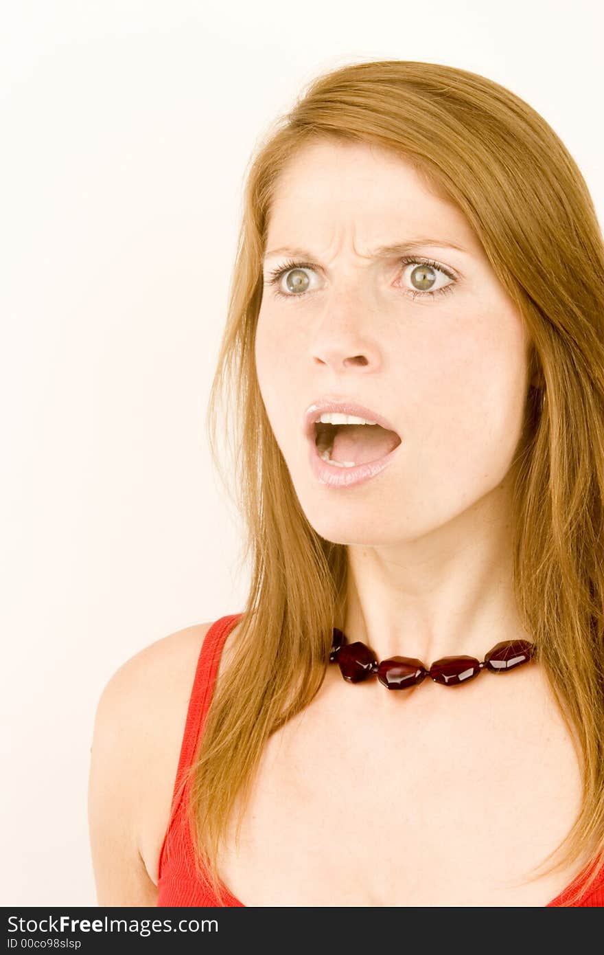 A portrait of a young woman against a plain background.