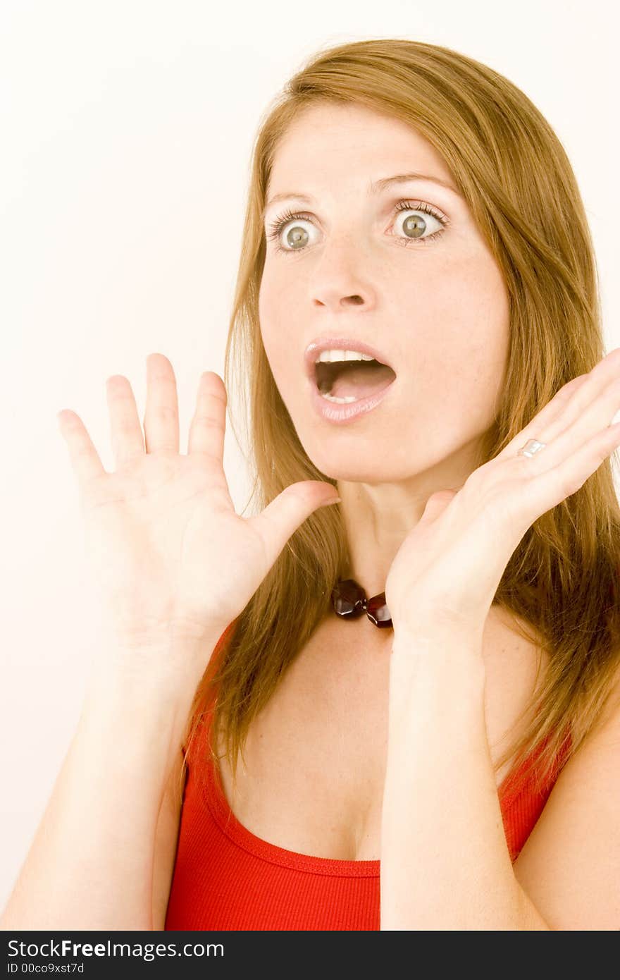 A portrait of a young woman against a plain background. A portrait of a young woman against a plain background.