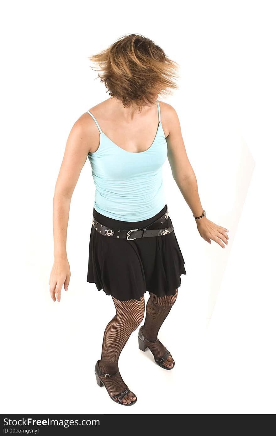 Woman dancing on white background