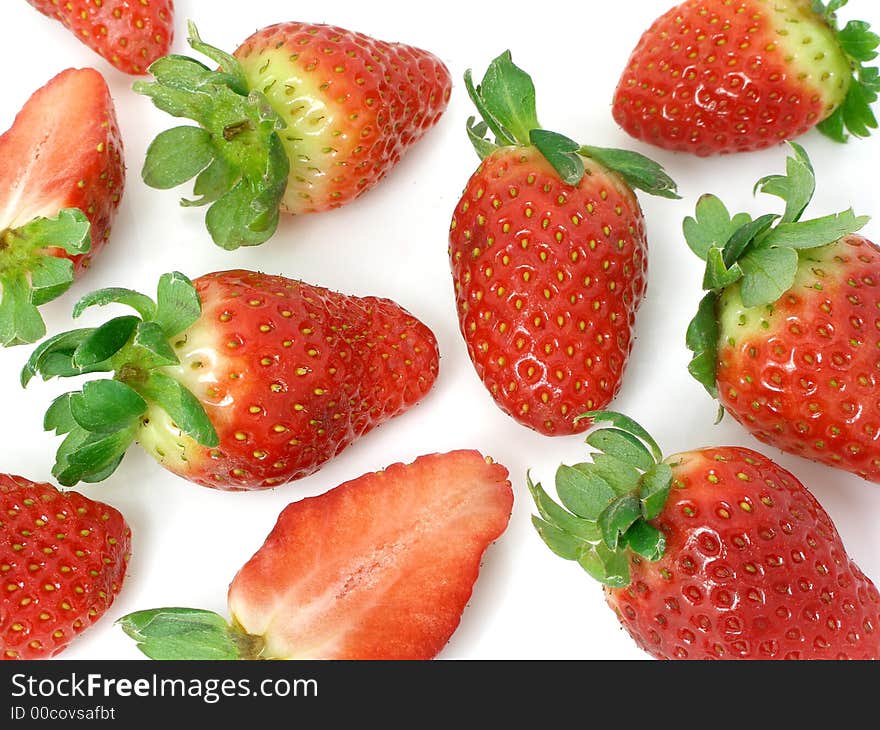 Strawberries on a gleamy surface. Strawberries on a gleamy surface