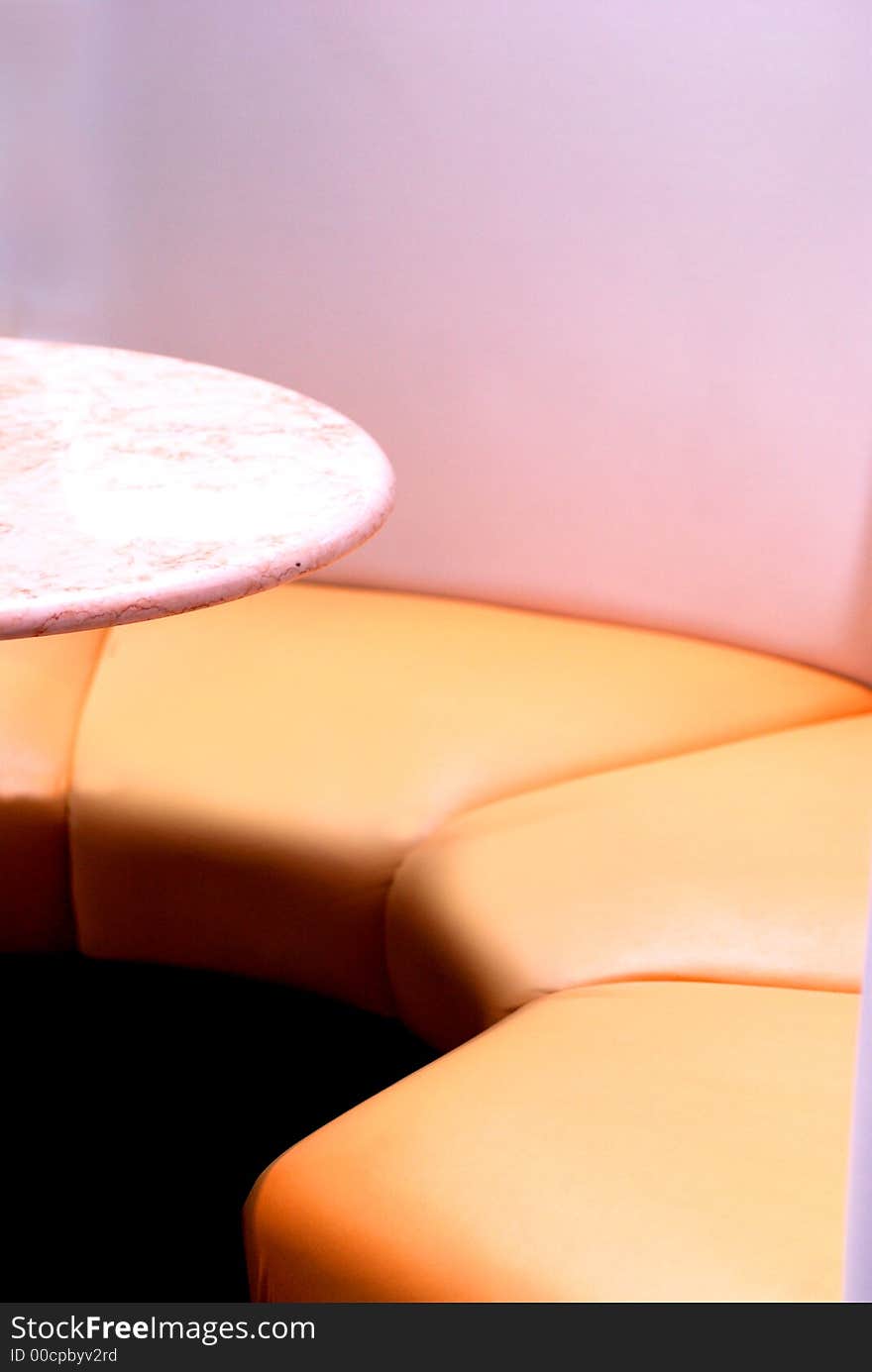 A couch and tables in a cafe. A couch and tables in a cafe