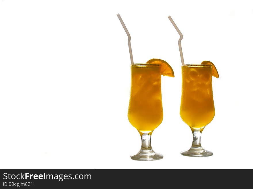 Two glasses of juice isolated over white