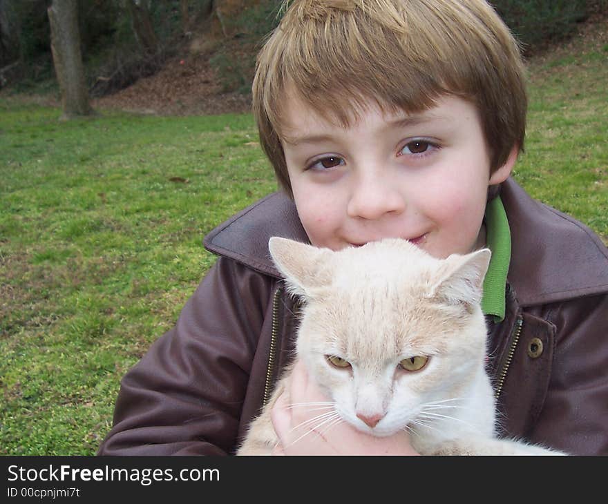 Portrait of boy and cat