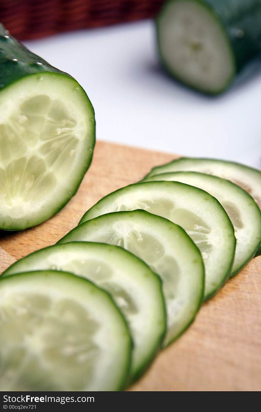 Fresh Cucumber in kitchen background