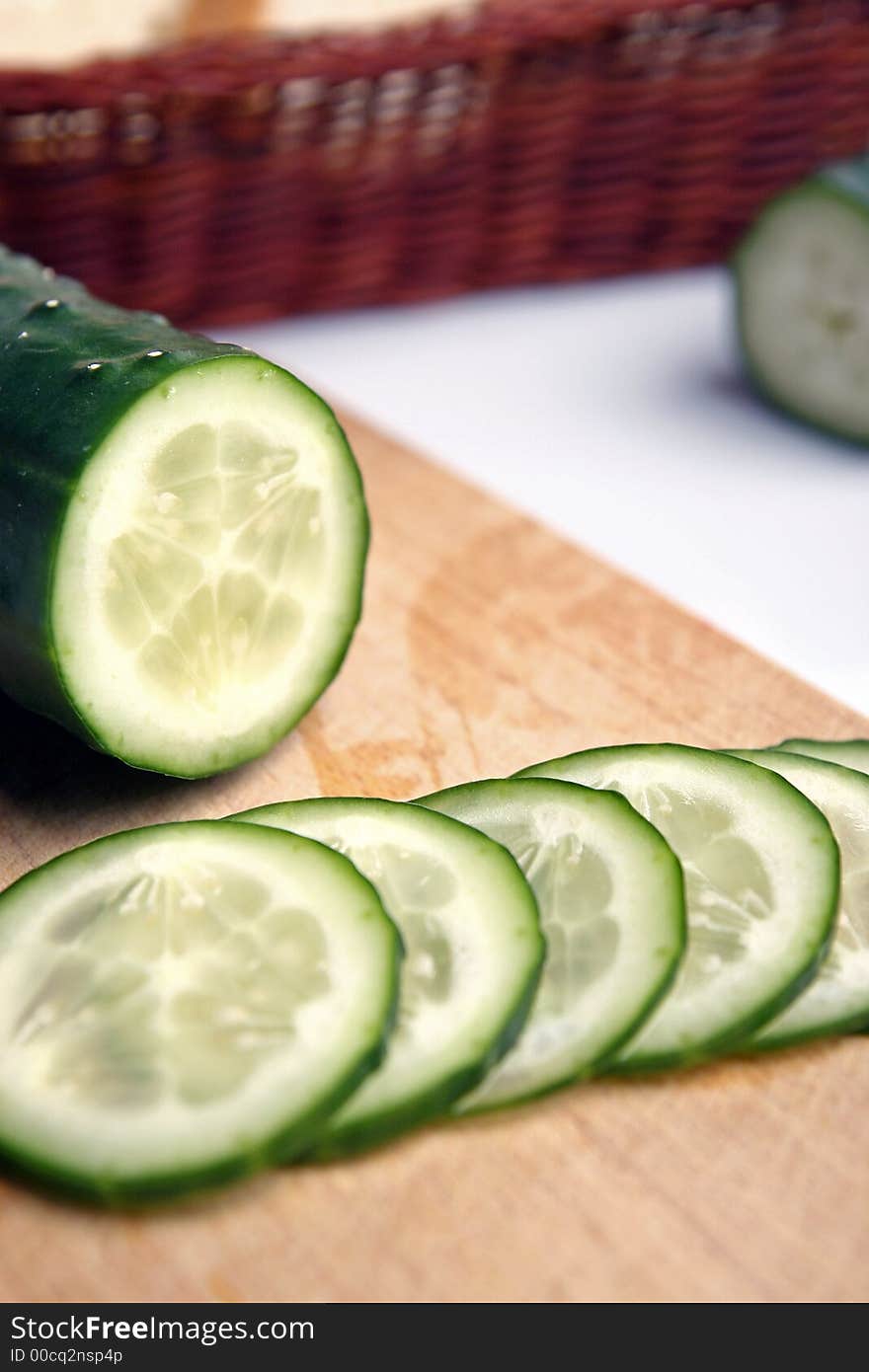 Fresh Cucumber in kitchen background