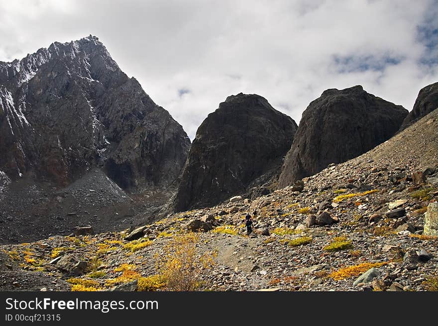 Mountains, big stone and peoples.