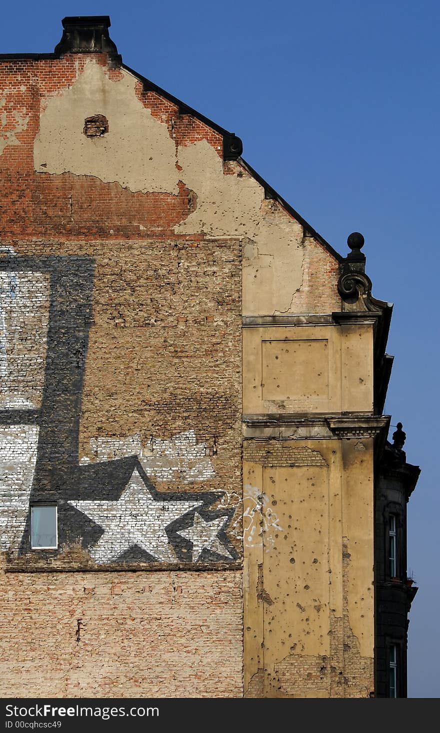 A typically sprayed wall in former East-Berlin. A typically sprayed wall in former East-Berlin