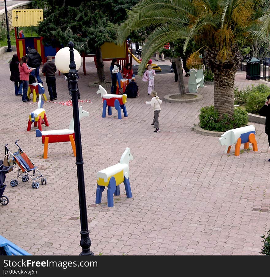 Children play in park on a game place