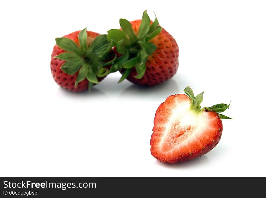 Half a Strawberry and a bunch of them. Half a Strawberry and a bunch of them