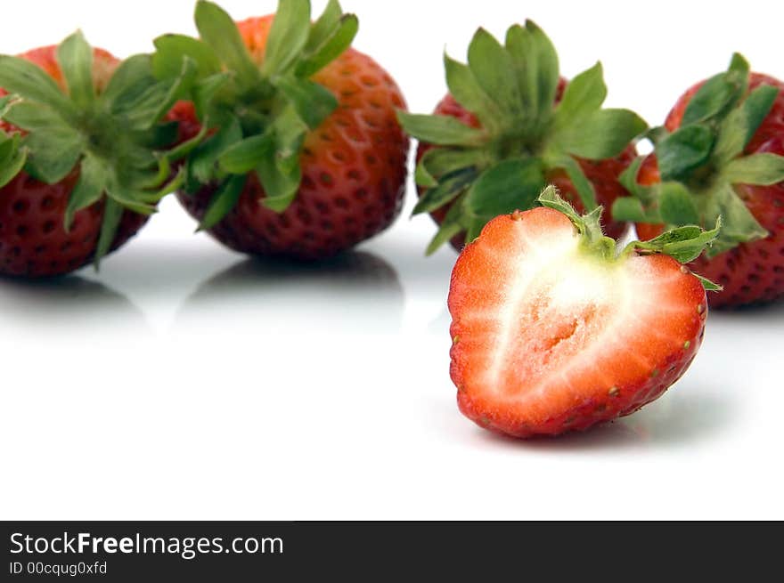 Half a Strawberry and a bunch of them. Half a Strawberry and a bunch of them