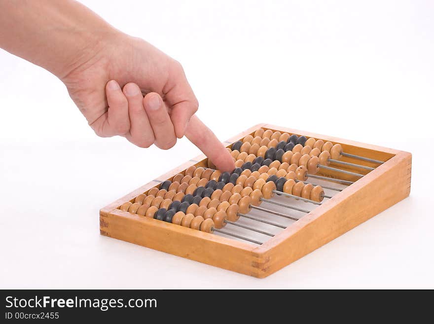 Moving bones on the counting frame by hand. Moving bones on the counting frame by hand