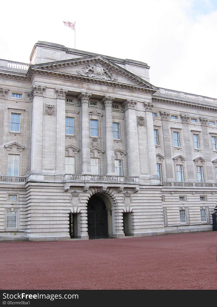 This image depicts the exterior of Buckingham Palace, London, England. The Queen is in residence.