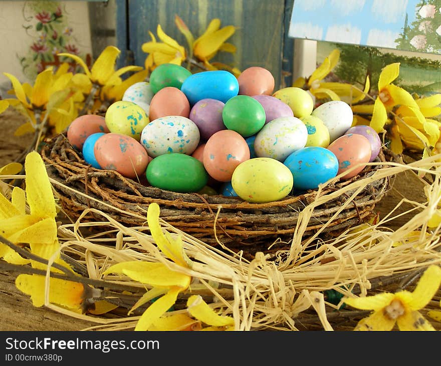 Easter Nest with Candy Eggs and forsythia wreath