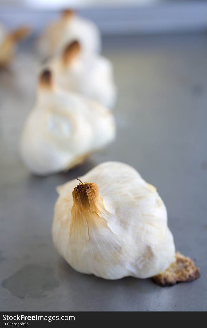 Garlic bulbs Roasted on a roasting pan