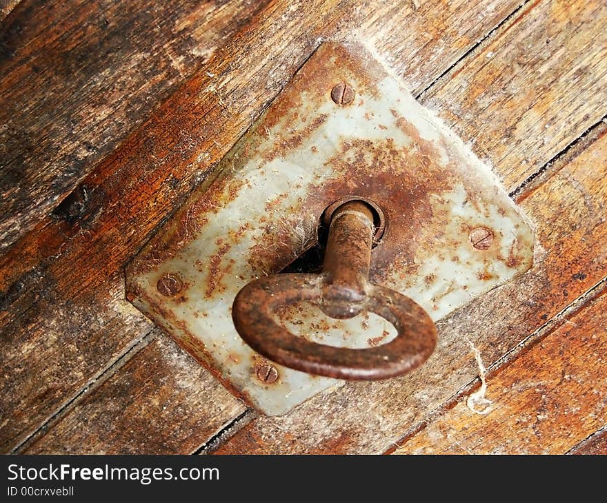 Old iron lock on old doors. Old iron lock on old doors