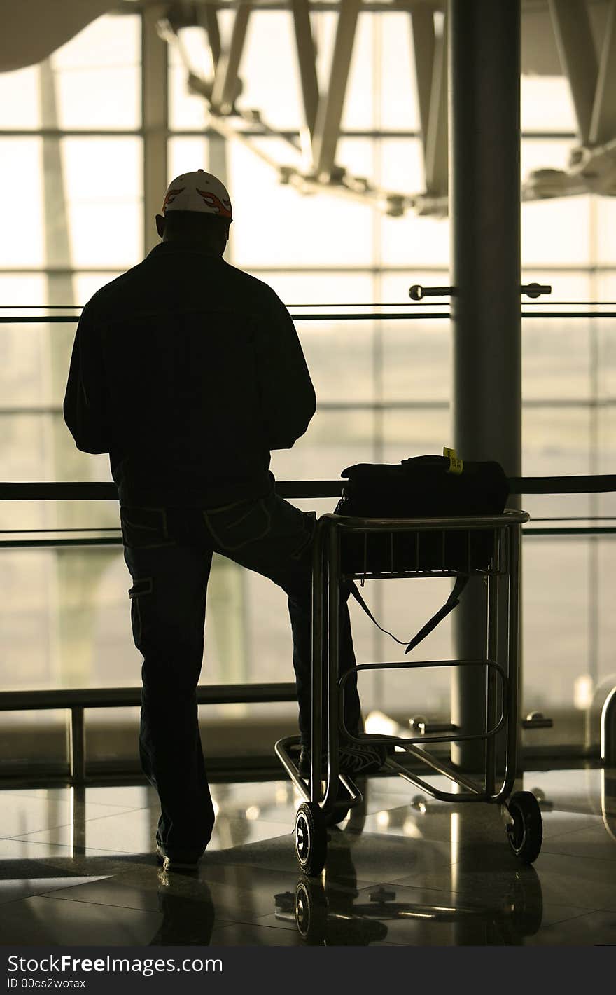 Man and trolley at the airport. Man and trolley at the airport