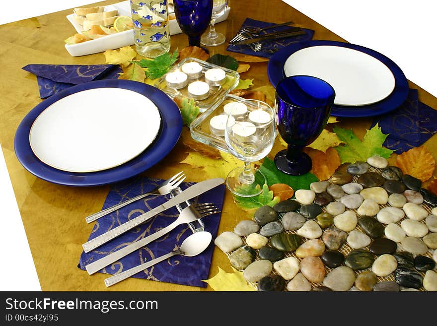 Laid table for two person with autumn leaves. Laid table for two person with autumn leaves