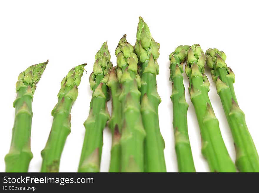 Shot of asparagus level on white