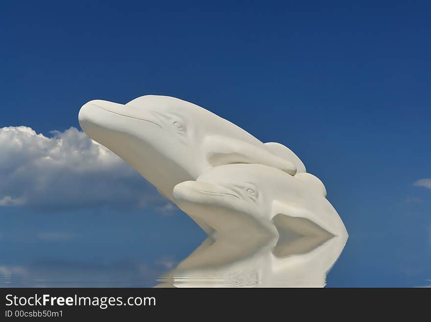 Happy dolphins from white greek marble