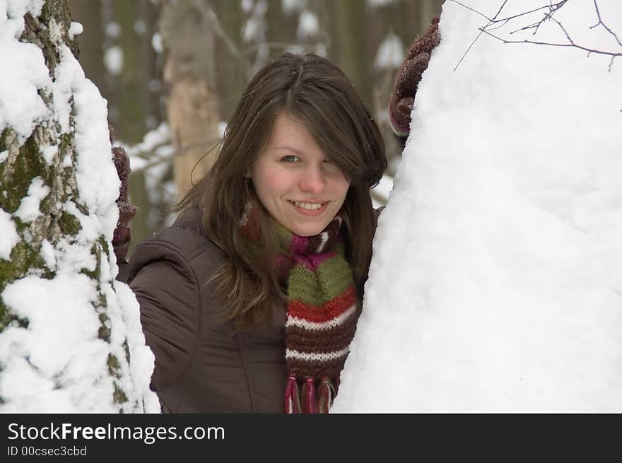 Young pretty woman in the winter forest. Young pretty woman in the winter forest