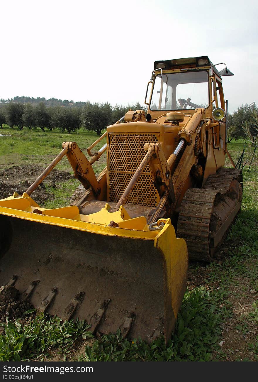 A yellow dozer unused for a long time