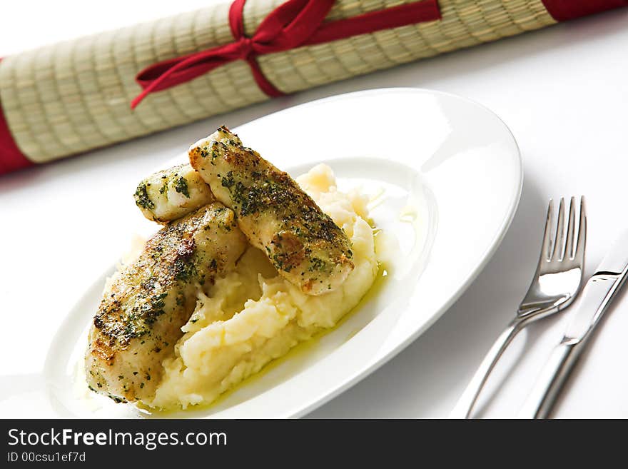 Basil topped fish over mash. Basil topped fish over mash