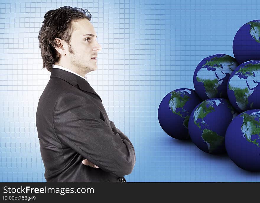 Businessman posin against technology background