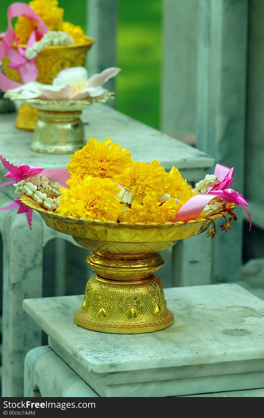 Flower offerings to the Buddha at a temple in Thailand