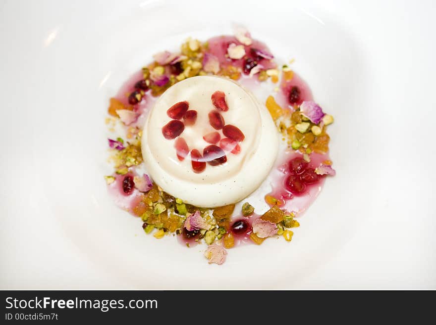 Creme berry dessert at nice restaurant on plate