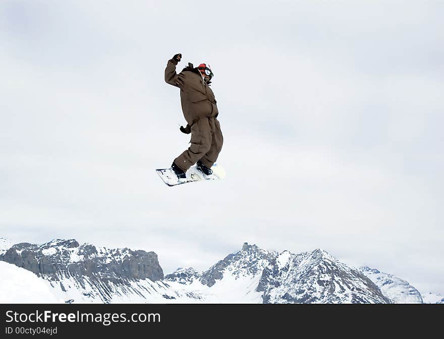 Snowboarder jumping high in the air