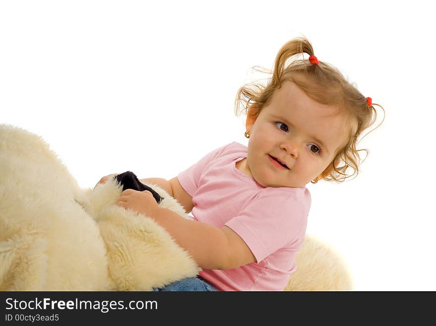 Cute little girl playing and having fun (isolated). Cute little girl playing and having fun (isolated)