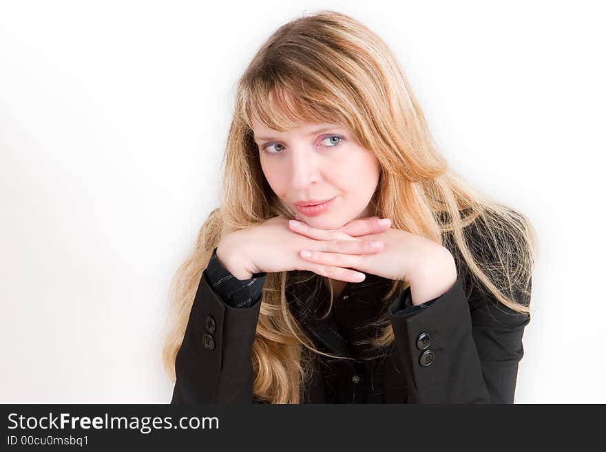 A Blond Woman Resting Her Chin On Her Hands