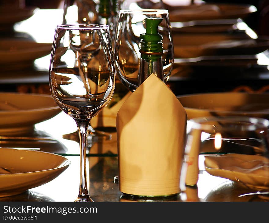 Table with dishes and glasses. Table with dishes and glasses