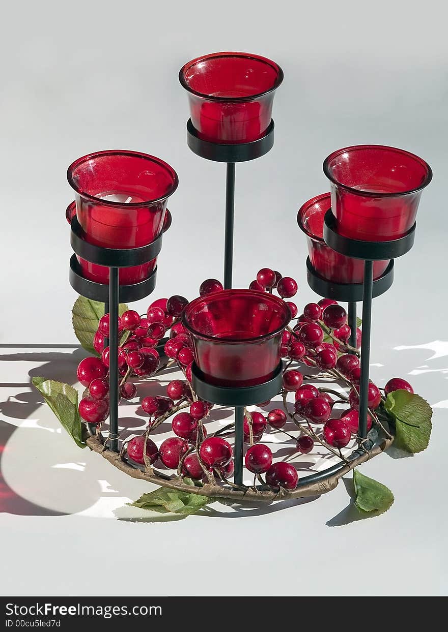 A decorative candle holder on white