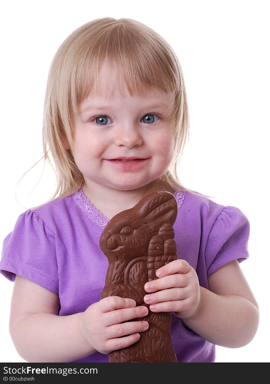 Toddler Holding A Chocolate Bunny