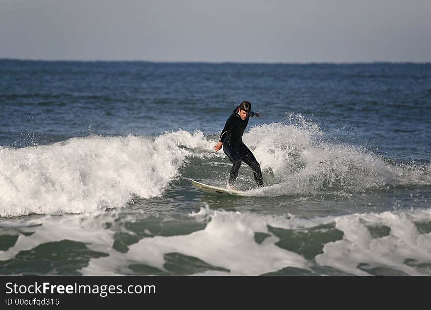 Surfer making a Forehand Cutback