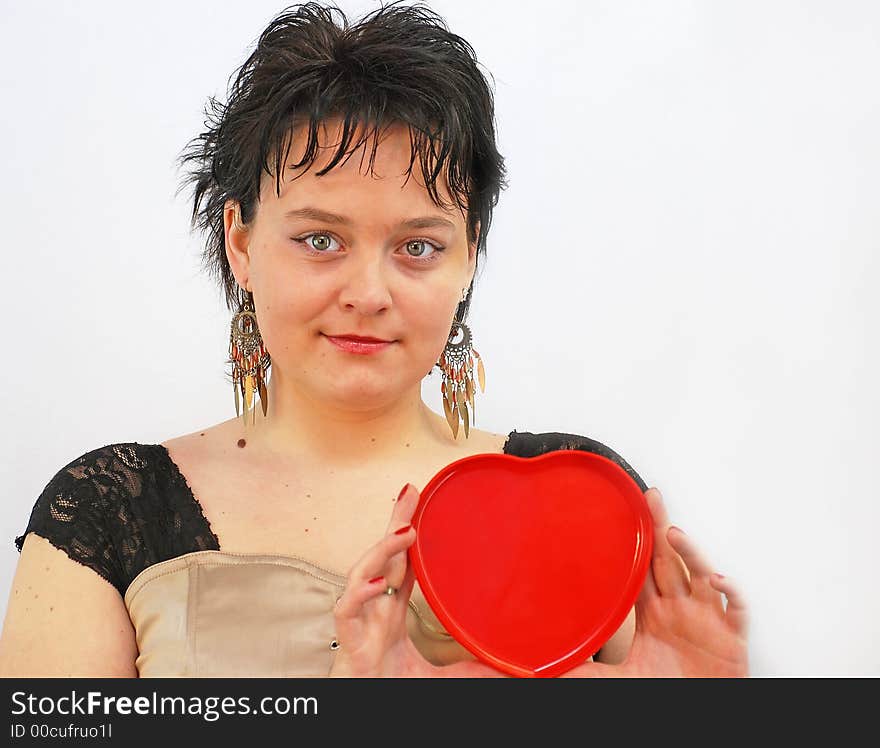 Women with heart shape in hands