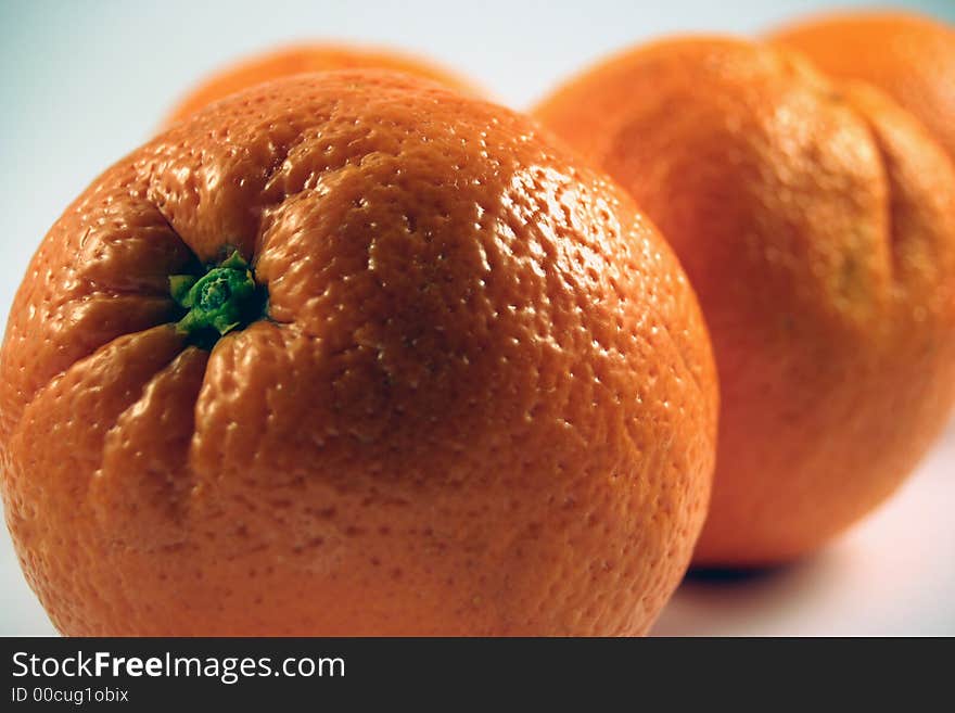 Oranges close up on a white background