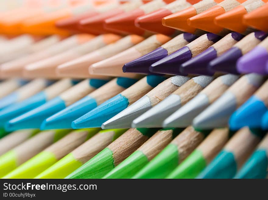 Abstract shot of stacked colored pencils. Shallow depth of field. Abstract shot of stacked colored pencils. Shallow depth of field.