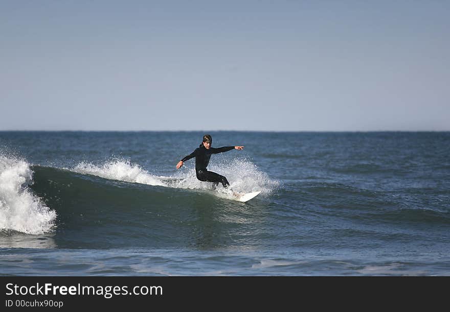 Surfer making a forehand cutback