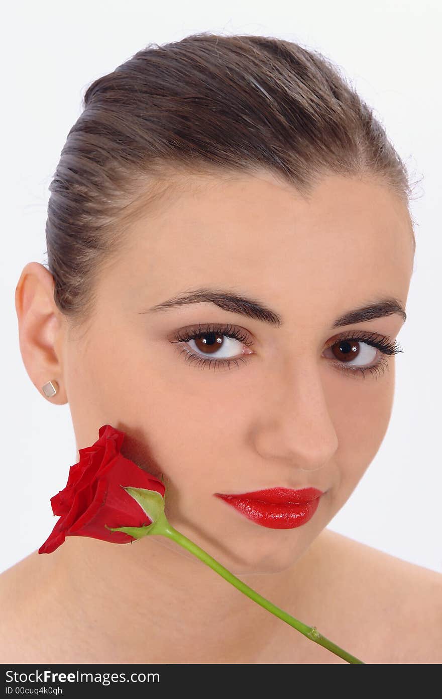 Isolated portrait of beauty with rose