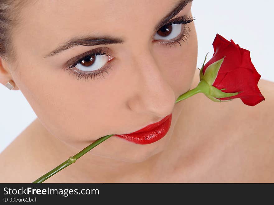 Isolated portrait of beauty with rose