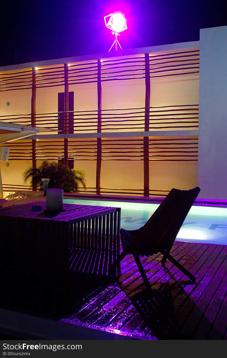 Inner patio with the swimming pool in a hotel with modern and minimalism decoration in Playa del Carmen, Cancun, Mexico, Latin America. Inner patio with the swimming pool in a hotel with modern and minimalism decoration in Playa del Carmen, Cancun, Mexico, Latin America