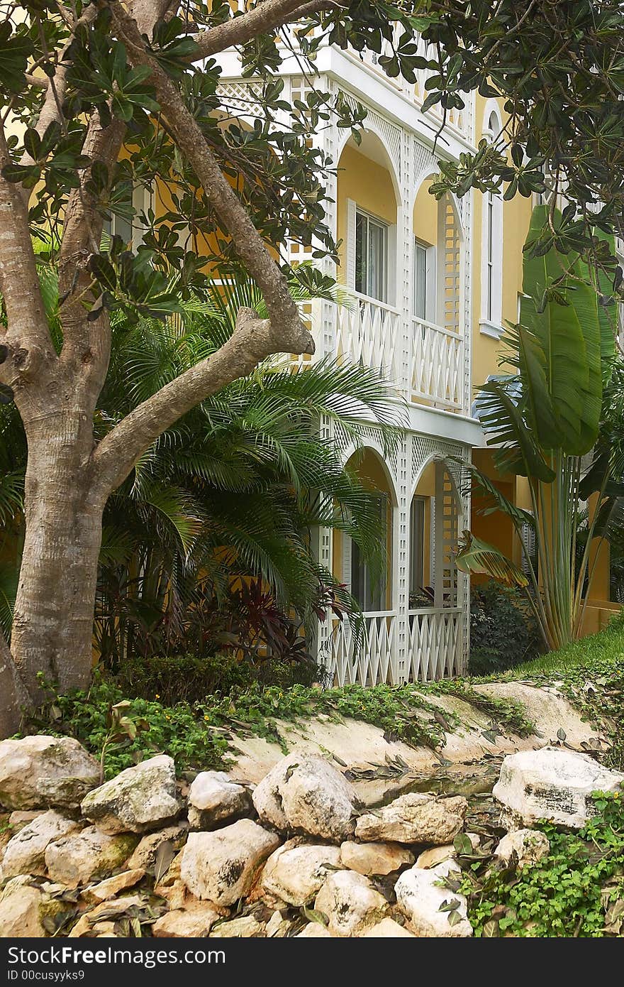 Garden detail of a hotel with hacienda like details in Cancun, Riviera Maya, Quinatan Roo, Mexico, Latin America. Garden detail of a hotel with hacienda like details in Cancun, Riviera Maya, Quinatan Roo, Mexico, Latin America