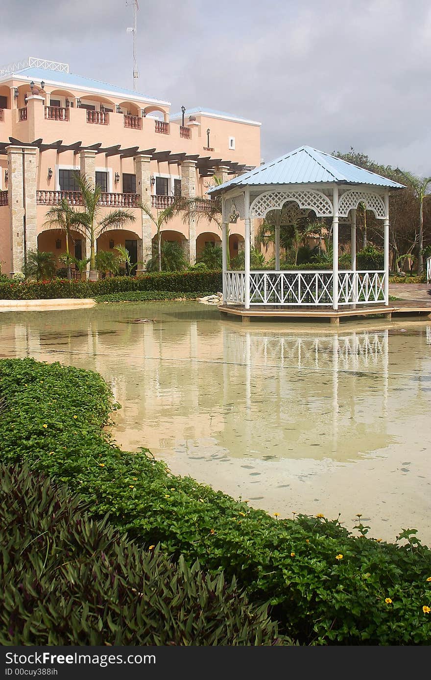 Artificial lake in  a hotel with hacienda like details in Cancun, Riviera Maya, Quinatan Roo, Mexico, Latin America. Artificial lake in  a hotel with hacienda like details in Cancun, Riviera Maya, Quinatan Roo, Mexico, Latin America