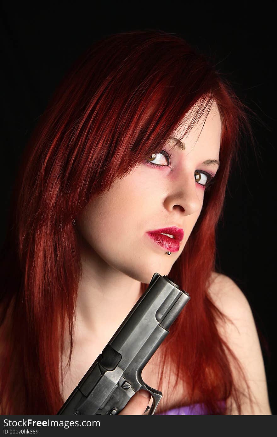 Woman holding a handgun