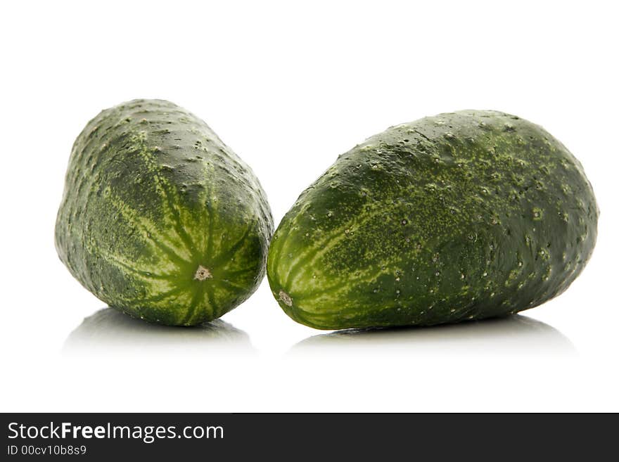 Close-up of gherkin over white background. Close-up of gherkin over white background