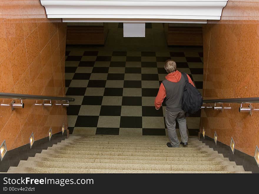 Man at Moscow subway. Come down to subway station. Man at Moscow subway. Come down to subway station.