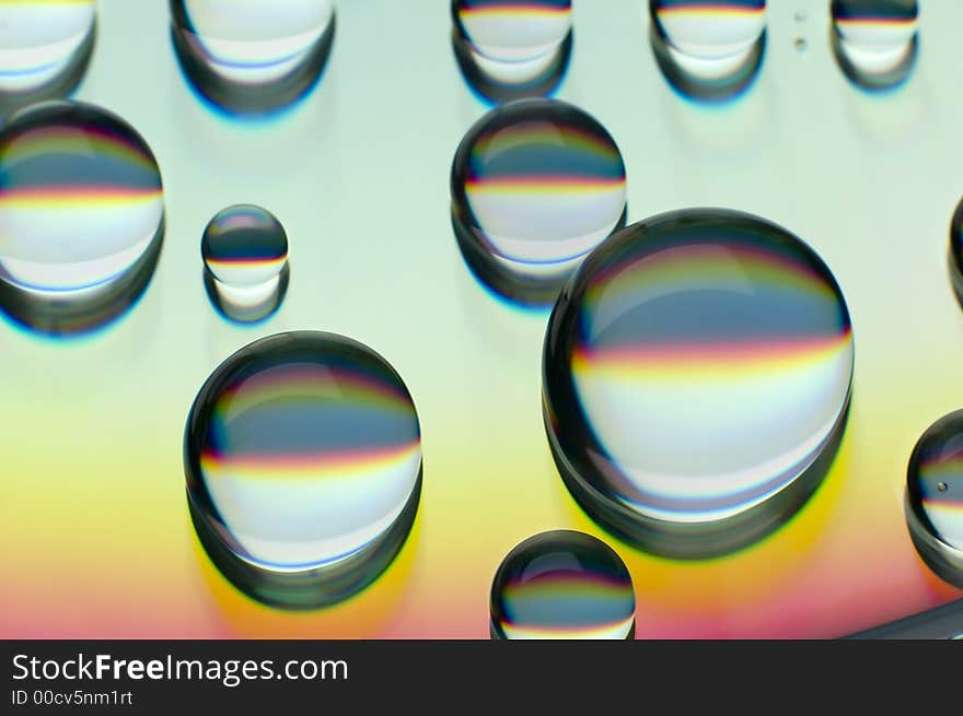 Water drops on compact disc close up